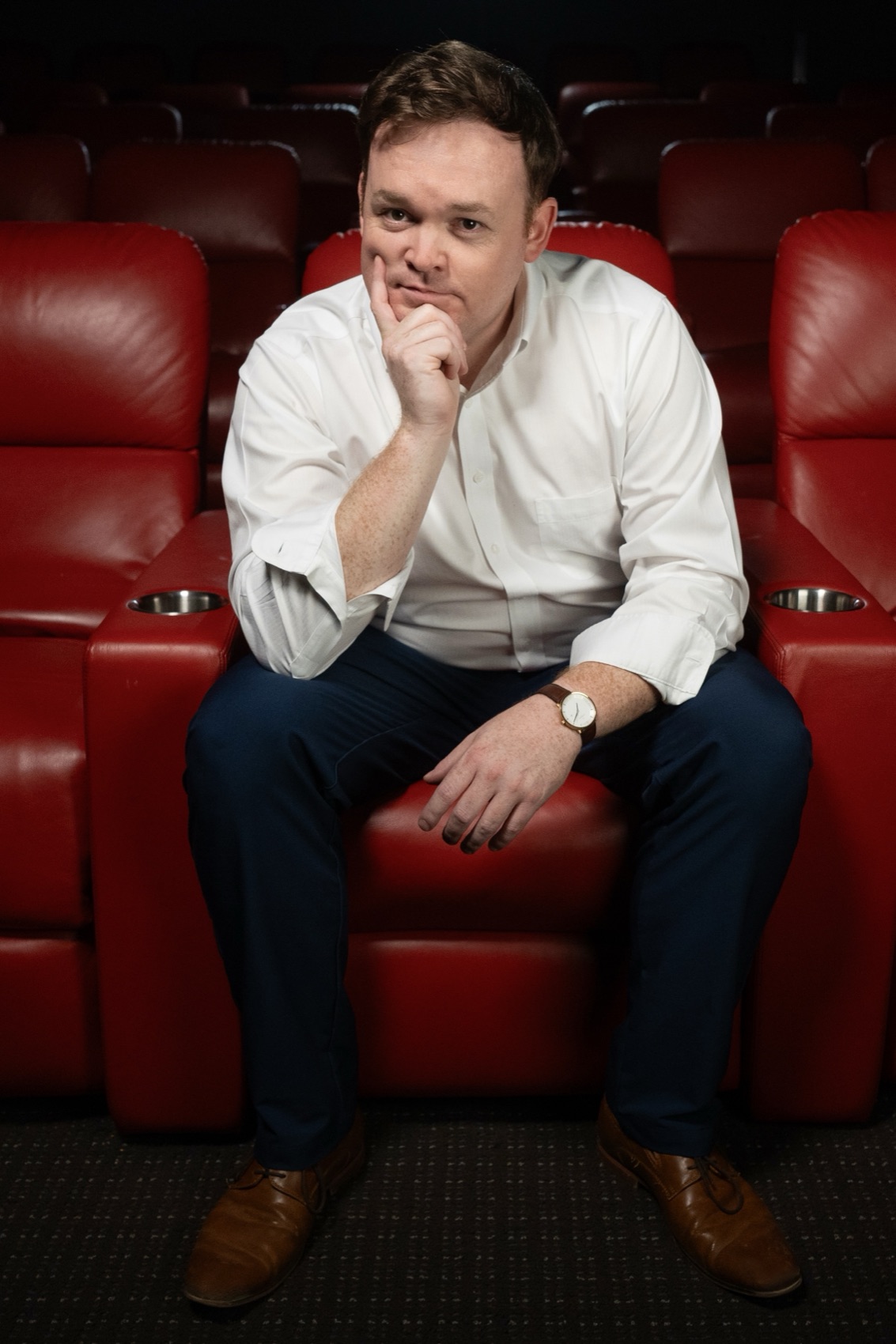 Portrait of Ben Davis in a cinema